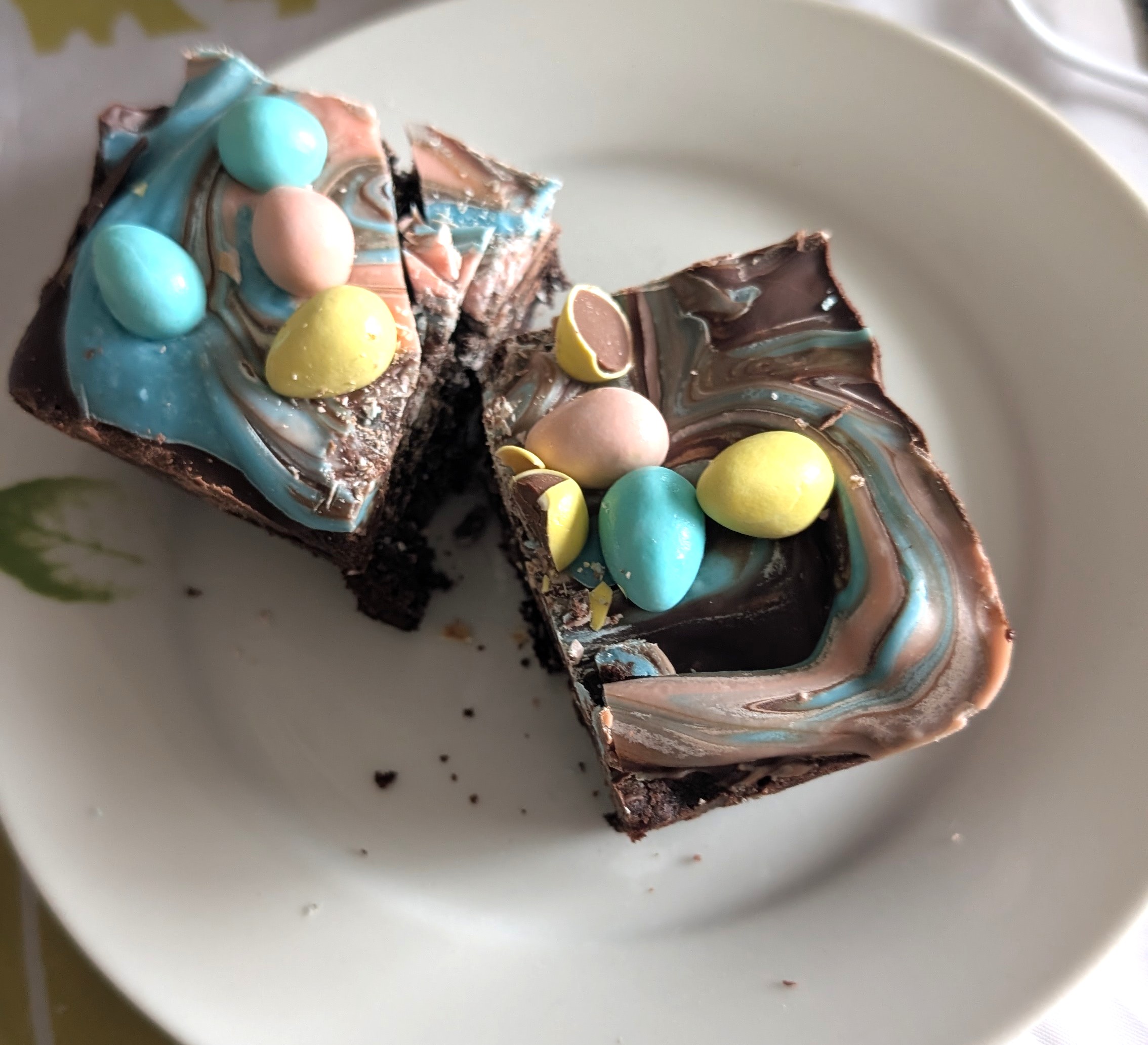 After the chocolate bark topping has set, cut your brownies into the size you like and serve!